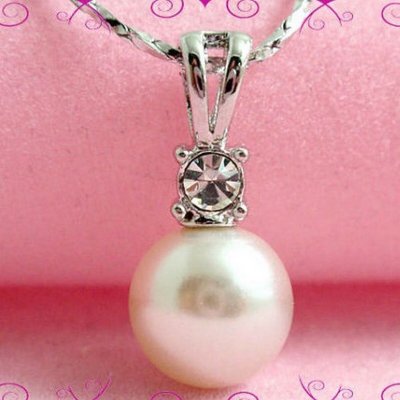 Bijoux de Mariage  - Pendentif ton argent avec cristal clair et perle blanche ... : illustration