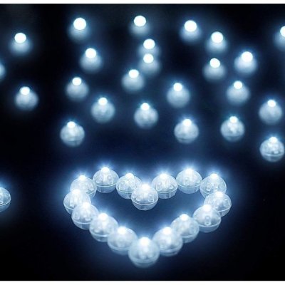 Perles pour dcoration de table  - 6 billes friques blanches bougies led tanches : illustration